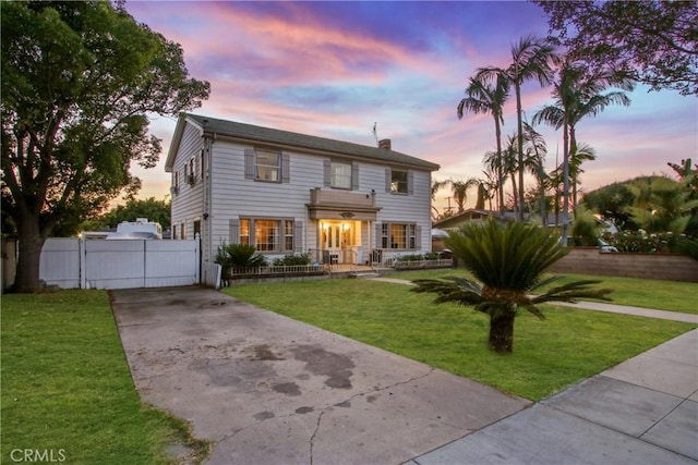 853 S Lemon St, Anaheim, CA 92805 - view of front of home with a chimney and driveway