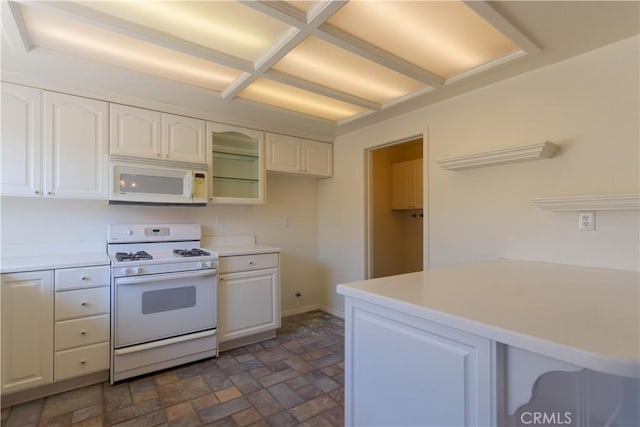 227 Gable Ln, La Habra, CA 90631 - kitchen with white appliances, white cabinets, glass insert cabinets, stone finish floors, and light countertops