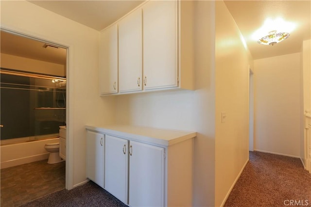 227 Gable Ln, La Habra, CA 90631 - hallway with dark carpet and baseboards