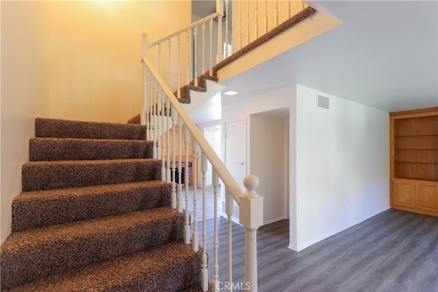 227 Gable Ln, La Habra, CA 90631 - stairs featuring wood finished floors and a towering ceiling
