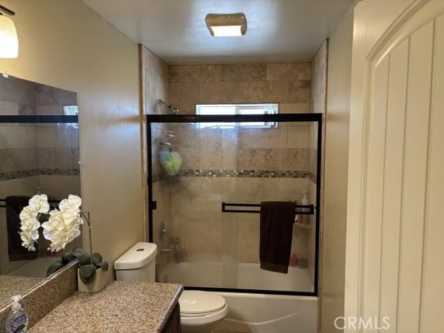 10401 Hemlock Ave, Hesperia, CA 92345 - full bathroom featuring vanity and combined bath / shower with glass door