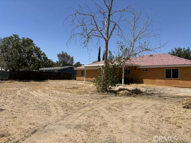 10401 Hemlock Ave, Hesperia, CA 92345 - view of property exterior with stucco siding