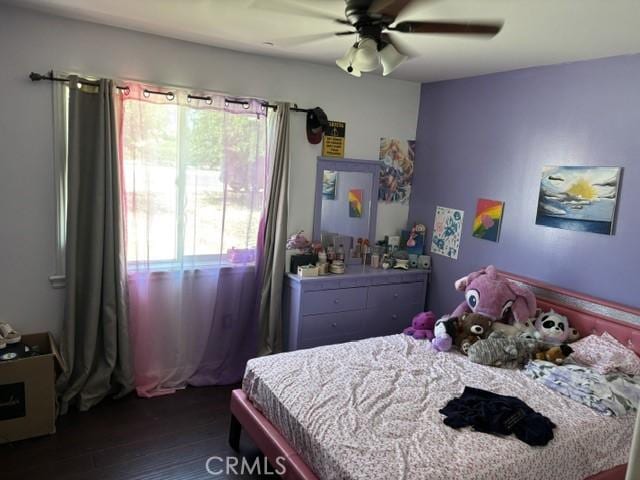 10401 Hemlock Ave, Hesperia, CA 92345 - bedroom featuring dark wood finished floors and ceiling fan
