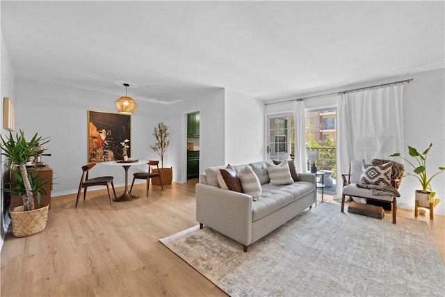 625 N Flores St Unit 202, West Hollywood, CA 90048 - living room with light wood finished floors