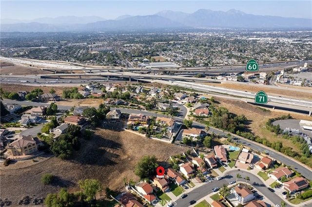 2566 Cottonwood Trl, Chino Hills, CA 91709 - aerial overview of property's location featuring a mountain backdrop and nearby suburban area