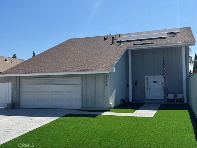 3609 S Parton St, Santa Ana, CA 92707 - view of front of property with a garage, solar panels, a front lawn, and concrete driveway