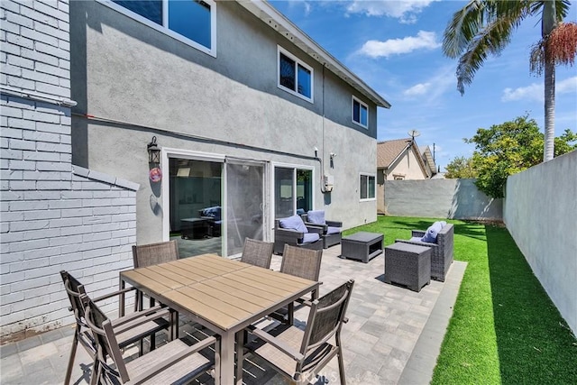 3609 S Parton St, Santa Ana, CA 92707 - fenced backyard featuring an outdoor living space and a patio
