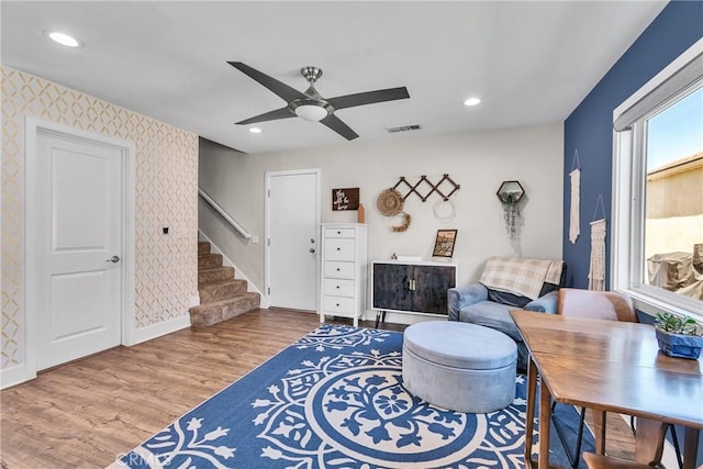 3609 S Parton St, Santa Ana, CA 92707 - living area with stairway, wood finished floors, ceiling fan, wallpapered walls, and recessed lighting