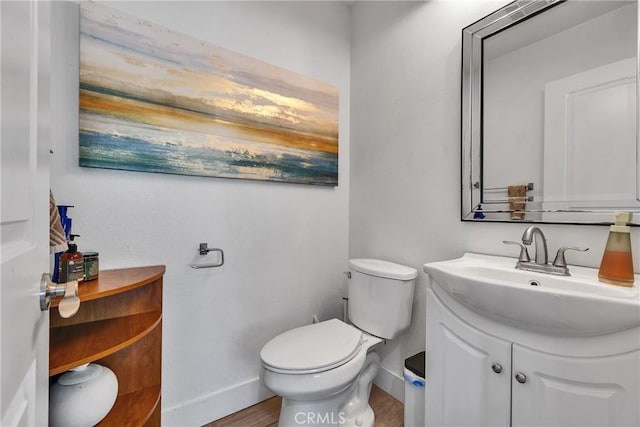 3609 S Parton St, Santa Ana, CA 92707 - half bath featuring vanity and wood finished floors