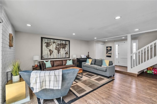 3609 S Parton St, Santa Ana, CA 92707 - living room with wood finished floors, recessed lighting, and stairs