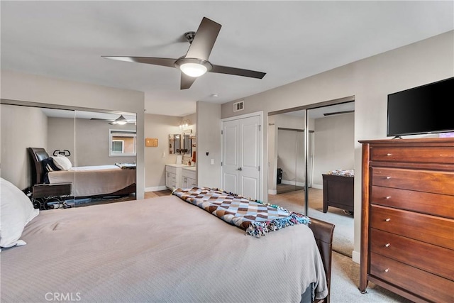 3609 S Parton St, Santa Ana, CA 92707 - bedroom featuring multiple closets and ceiling fan