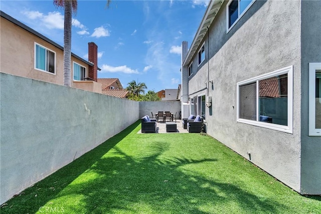 3609 S Parton St, Santa Ana, CA 92707 - fenced backyard featuring an outdoor living space and a patio