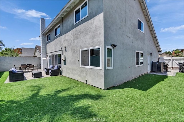 3609 S Parton St, Santa Ana, CA 92707 - back of house featuring an outdoor hangout area, stucco siding, a fenced backyard, and a patio area