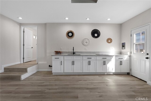 16228 Plummer St, North Hills, CA 91343 - bar featuring light wood finished floors and recessed lighting