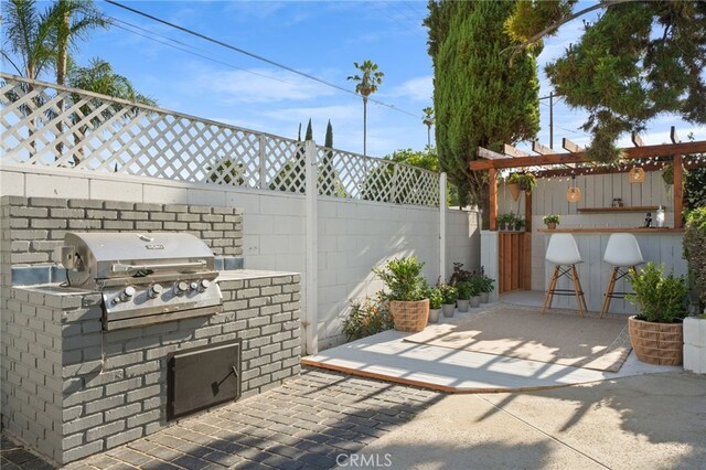 16228 Plummer St, North Hills, CA 91343 - fenced backyard featuring area for grilling and a patio