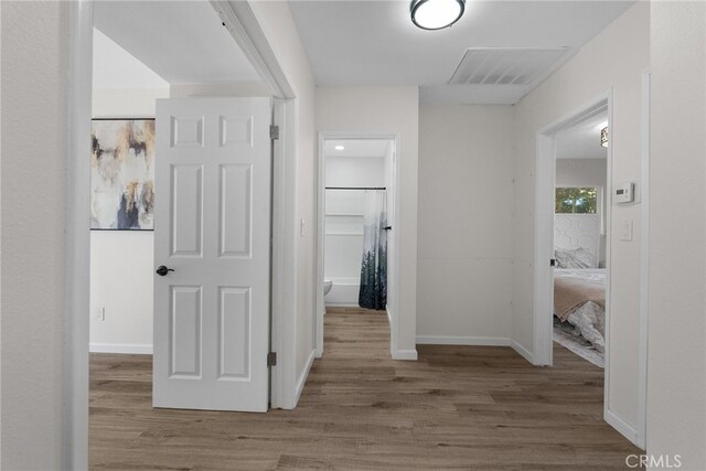 16228 Plummer St, North Hills, CA 91343 - corridor with wood finished floors
