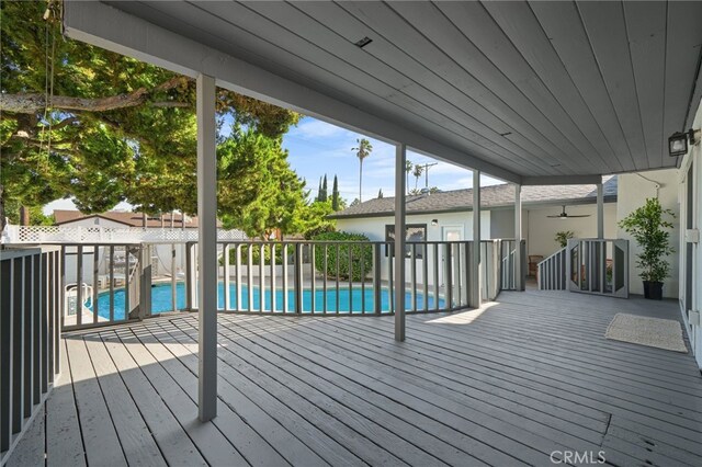 16228 Plummer St, North Hills, CA 91343 - deck featuring a fenced backyard and a ceiling fan