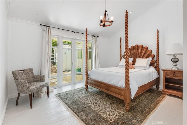 16 Roadrunner Rd, Rolling Hills, CA 90274 - bedroom featuring access to outside, a chandelier, french doors, lofted ceiling, and wood finished floors