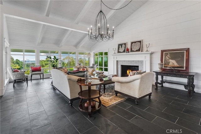 16 Roadrunner Rd, Rolling Hills, CA 90274 - living room with high vaulted ceiling, beam ceiling, a chandelier, and a brick fireplace