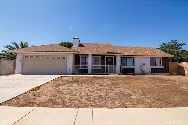 1714 Evelyn Pl, Palmdale, CA 93550 - single story home featuring an attached garage, covered porch, driveway, a chimney, and stucco siding