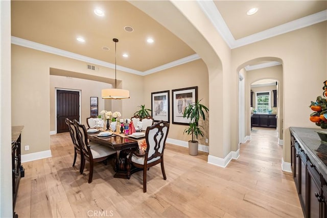 19668 Three Oaks Ln, Walnut, CA 91789 - dining room with arched walkways, light wood-style flooring, ornamental molding, and recessed lighting
