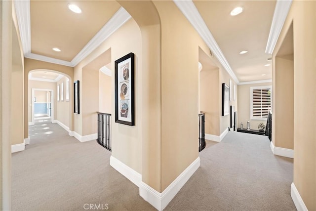 19668 Three Oaks Ln, Walnut, CA 91789 - corridor featuring carpet flooring, arched walkways, crown molding, and recessed lighting
