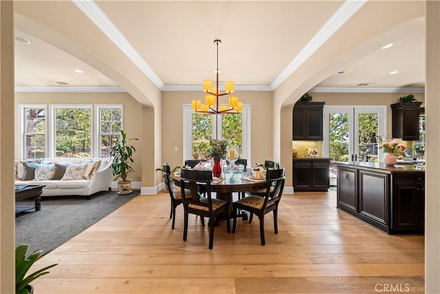 19668 Three Oaks Ln, Walnut, CA 91789 - dining area with arched walkways, a chandelier, plenty of natural light, crown molding, and recessed lighting