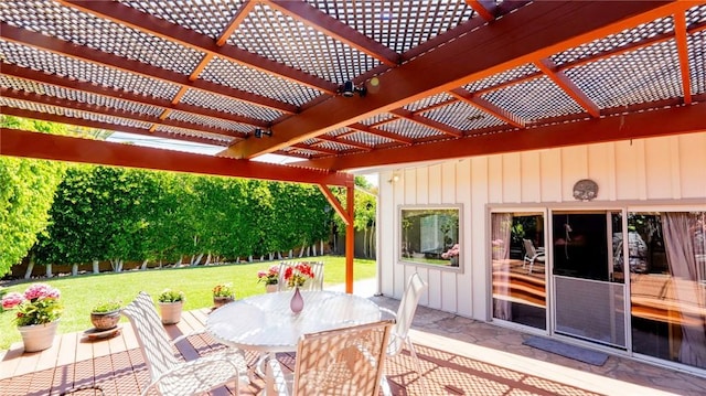 3456 Veteran Ave, Los Angeles, CA 90034 - wooden terrace featuring a lawn, a pergola, outdoor dining area, and a patio