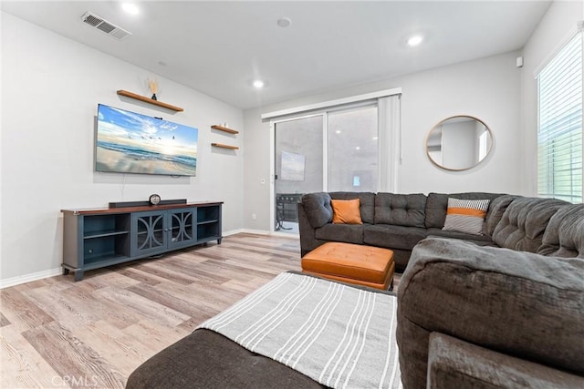 16004 Huckleberry Ave, Chino, CA 91708 - living area with light wood-style flooring and recessed lighting