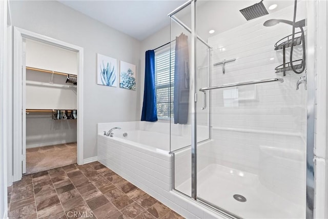 16004 Huckleberry Ave, Chino, CA 91708 - bathroom with a stall shower, a bath, and a spacious closet