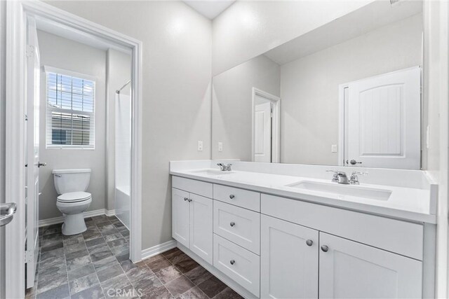 16004 Huckleberry Ave, Chino, CA 91708 - bathroom with double vanity and shower / bath combination