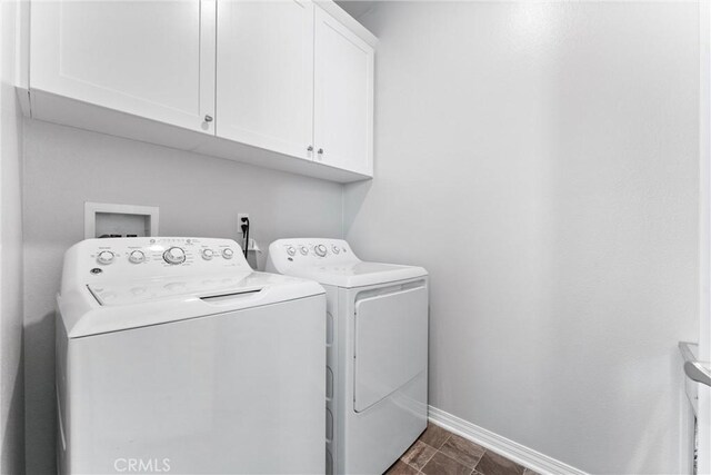 16004 Huckleberry Ave, Chino, CA 91708 - laundry area featuring separate washer and dryer and cabinet space