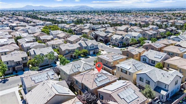 16004 Huckleberry Ave, Chino, CA 91708 - aerial perspective of suburban area featuring a mountain backdrop