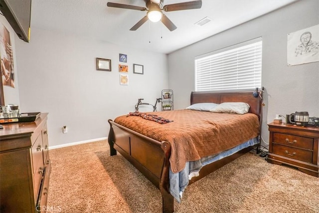 17993 Mondamon Rd, Apple Valley, CA 92307 - bedroom with light colored carpet and ceiling fan