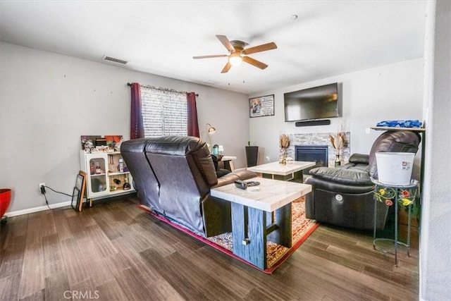 17993 Mondamon Rd, Apple Valley, CA 92307 - living area featuring wood finished floors, ceiling fan, and a fireplace