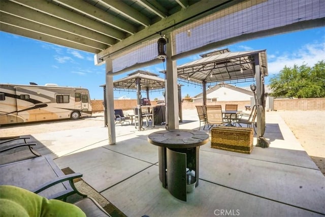 17993 Mondamon Rd, Apple Valley, CA 92307 - view of patio with a gazebo and outdoor dining space
