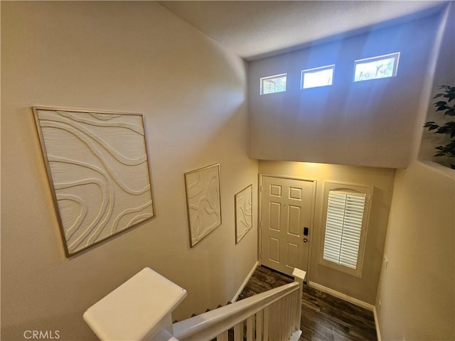 11 Emory Unit 85, Irvine, CA 92602 - staircase featuring wood finished floors and baseboards
