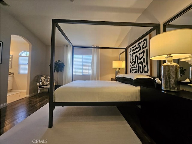 11 Emory Unit 85, Irvine, CA 92602 - bedroom with wood finished floors and arched walkways