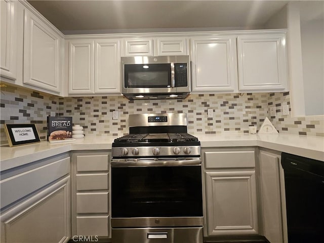 11 Emory Unit 85, Irvine, CA 92602 - kitchen with appliances with stainless steel finishes, light countertops, white cabinetry, and tasteful backsplash