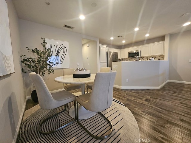 11 Emory Unit 85, Irvine, CA 92602 - dining area featuring dark wood finished floors and recessed lighting
