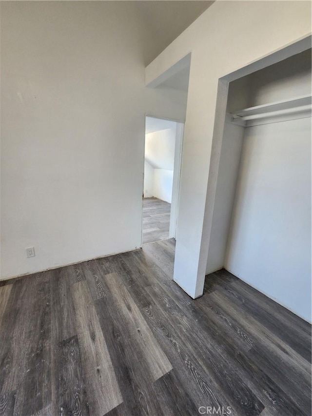 700 E Compton Blvd, Rancho Dominguez, CA 90220 - unfurnished bedroom featuring wood finished floors and a closet