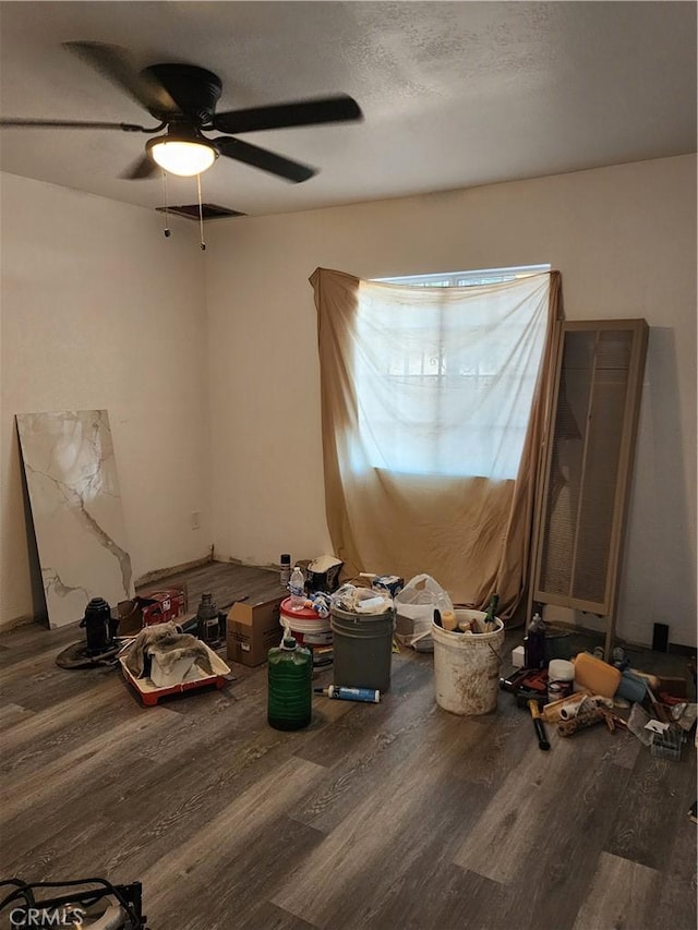 700 E Compton Blvd, Rancho Dominguez, CA 90220 - unfurnished bedroom featuring wood finished floors, a ceiling fan, and a textured ceiling