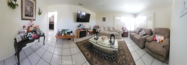 8502 Borson St, Downey, CA 90242 - living area featuring light tile patterned floors