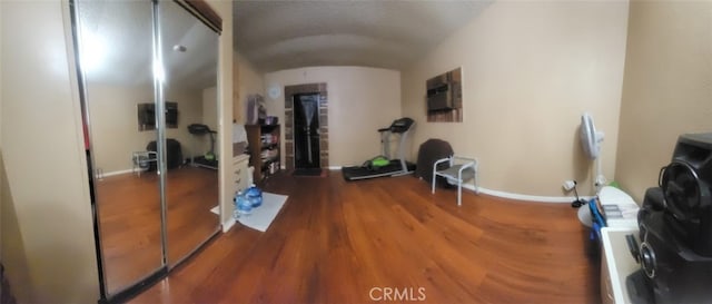 8502 Borson St, Downey, CA 90242 - workout area featuring wood finished floors and lofted ceiling