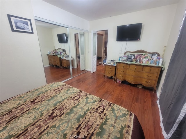 8502 Borson St, Downey, CA 90242 - bedroom featuring wood finished floors and a closet
