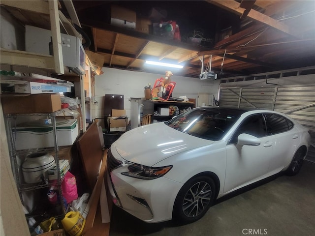 8502 Borson St, Downey, CA 90242 - garage featuring a garage door opener