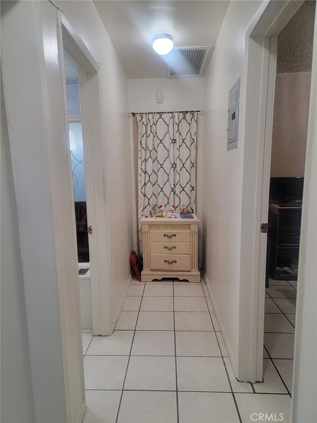 8502 Borson St, Downey, CA 90242 - hall featuring light tile patterned flooring and electric panel