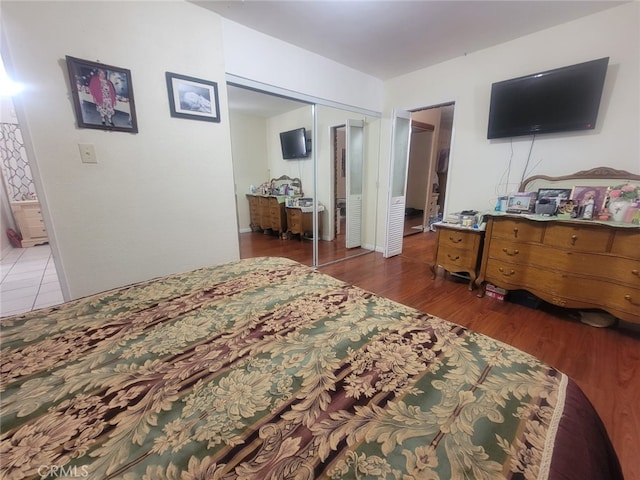 8502 Borson St, Downey, CA 90242 - bedroom with a closet, wood finished floors, and ensuite bath