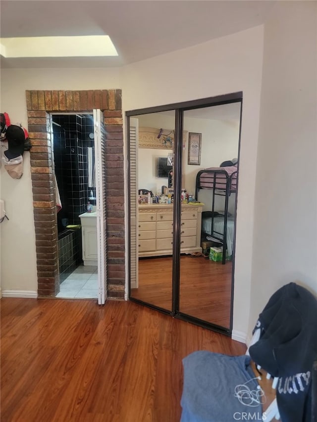 8502 Borson St, Downey, CA 90242 - bedroom featuring wood finished floors and baseboards