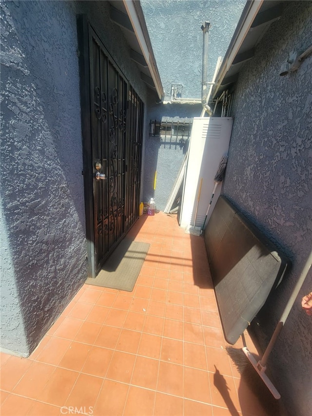 8502 Borson St, Downey, CA 90242 - doorway to property featuring stucco siding
